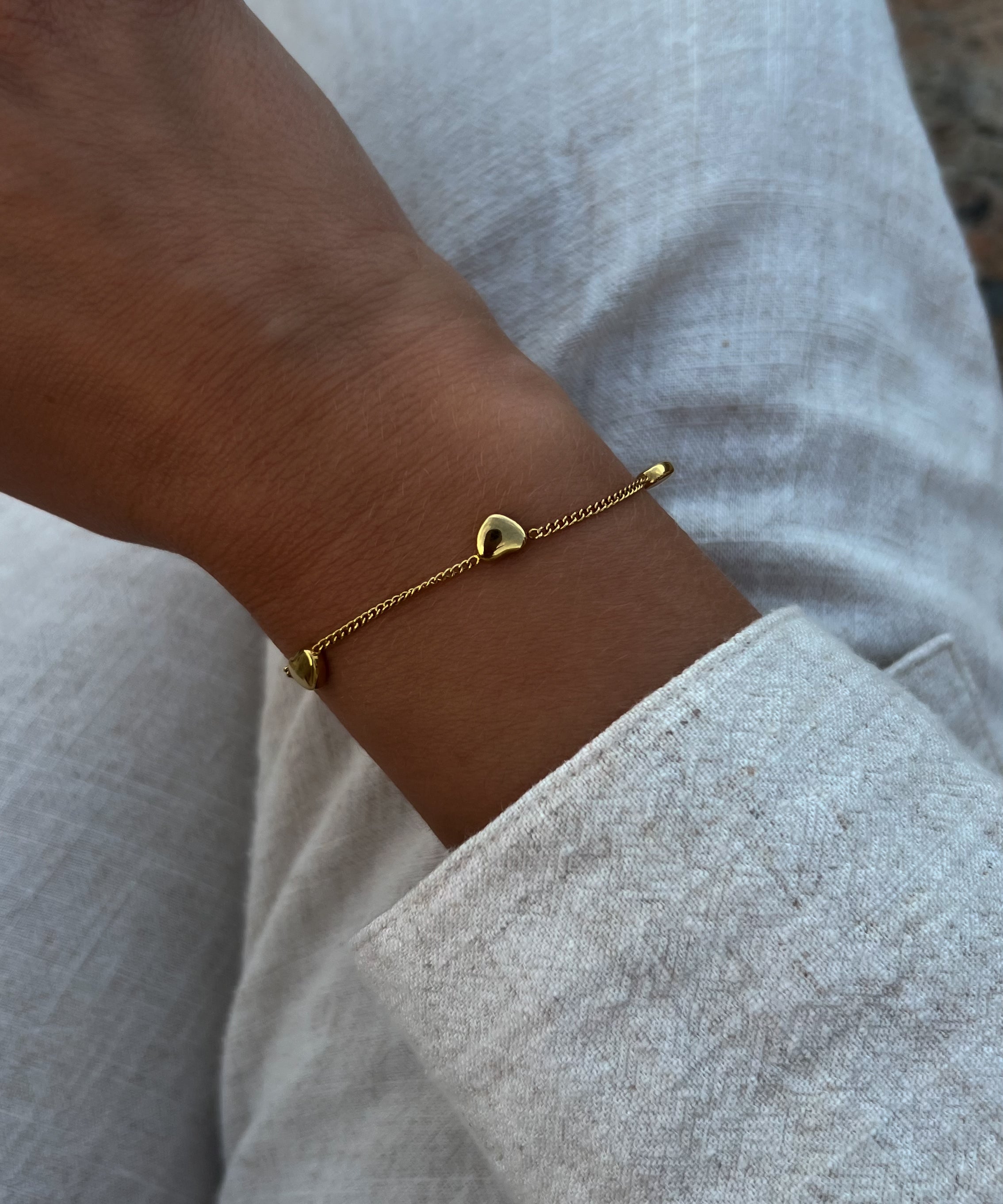 Gullhjerter Armbånd